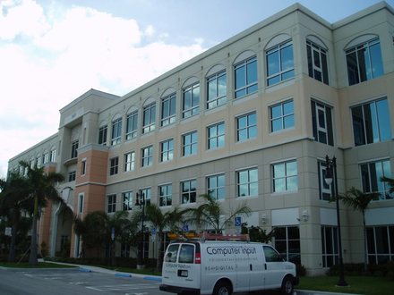 An early Computer Input van outside an office in South Florida